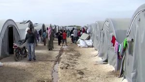 Overcrowded conditions in a refugee tent city.